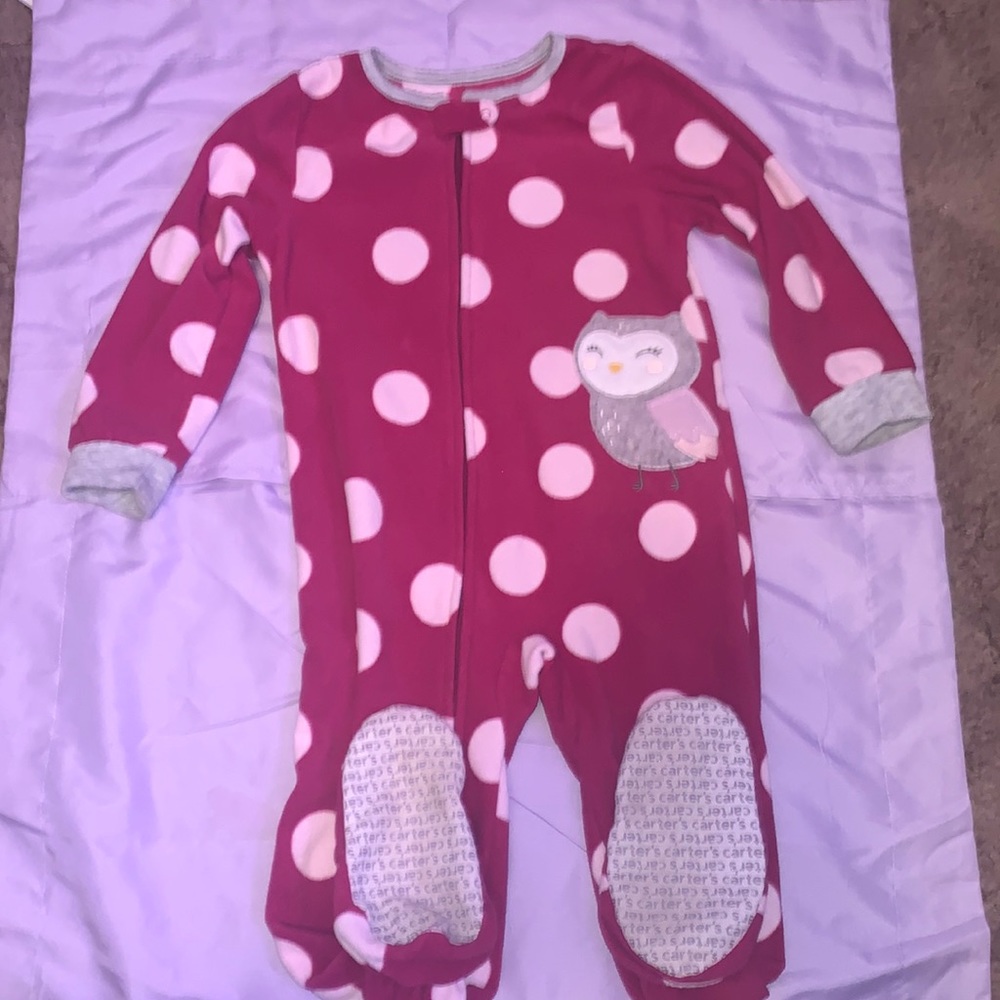 2T onesie with grip footing on the bottom.